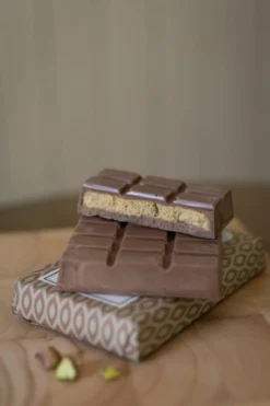 Chocoladetablet, melk en pistachecrème, 140 gram