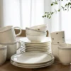 Kom met blauwe stip, organisch, porselein, Ø 12 cm